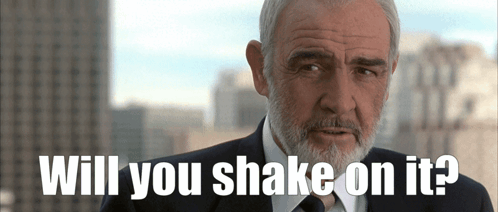 A Man In A Suit And Tie Is Asking If He Should Shake On It GIF