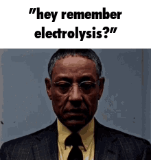 A Man In A Suit And Tie Is Asking Someone If They Remember Electrolysis . GIF