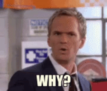 A Man In A Suit And Tie Is Asking The Question Why ? GIF