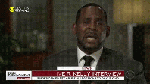 A Man In A Suit And Tie Is Being Interviewed On Cbs Evening News GIF