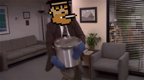 A Man In A Suit And Tie Is Carrying A Pot GIF