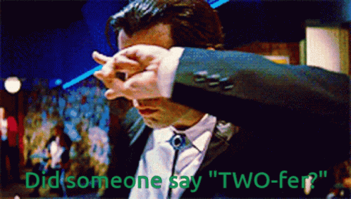 A Man In A Suit And Tie Is Covering His Face With His Hands And The Words Did Someone Say " Two-Fer " GIF