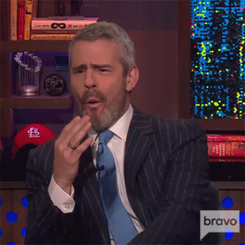 Man In Suit Covering Mouth With Bravo Text GIF