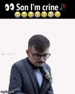 A Man In A Suit And Tie Is Crying With A Caption That Says Son I 'M Crine .. GIF