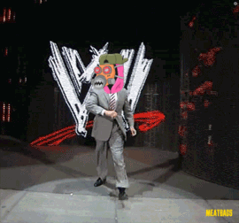 A Man In A Suit And Tie Is Dancing On A Stage In Front Of A W Logo GIF