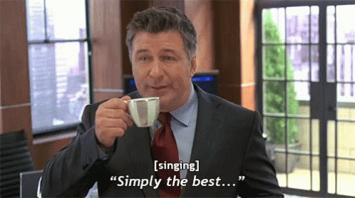 A Man In A Suit And Tie Is Drinking A Cup Of Coffee And Says " Singing Simply The Best ... " GIF