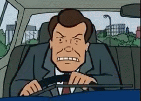 A Man In A Suit And Tie Is Driving A Car GIF