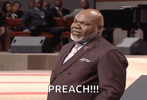 A Man In A Suit And Tie Is Giving A Sermon And Says Preach !!! GIF