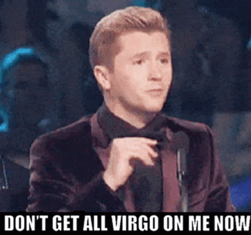 A Man In A Suit And Tie Is Giving A Speech And Says " Do N't Get All Virgo On Me Now " GIF