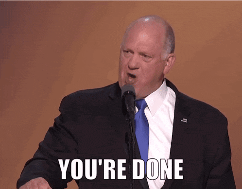 A Man In A Suit And Tie Is Giving A Speech And Says You 'Re Done GIF