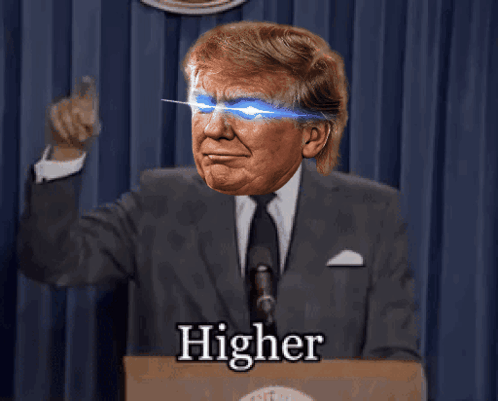 A Man In A Suit And Tie Is Giving A Speech And The Word Higher Is On The Front GIF