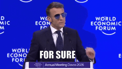 A Man In A Suit And Tie Is Giving A Speech At The World Economic Forum Annual Meeting GIF