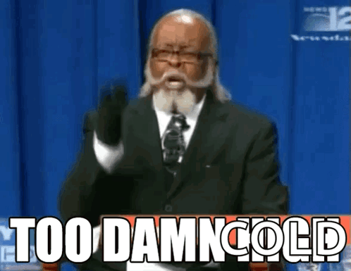A Man In A Suit And Tie Is Giving A Speech That Says Too Damn Cold GIF