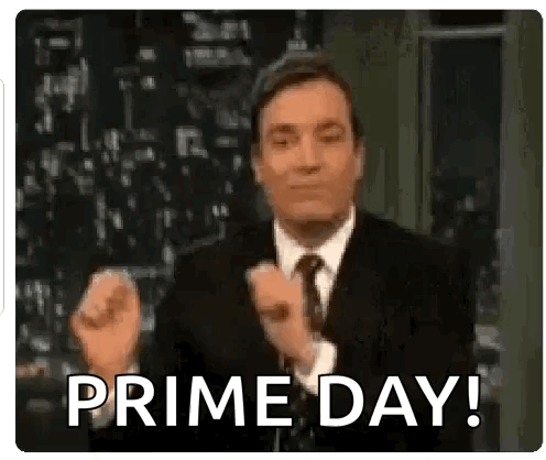 A Man In A Suit And Tie Is Giving A Thumbs Up Sign . GIF