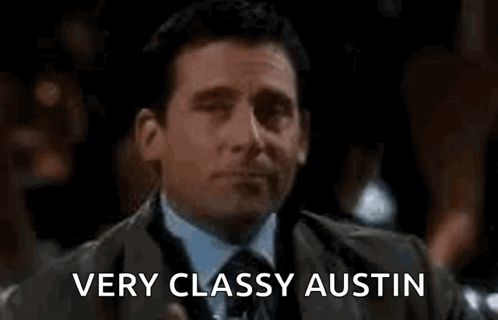 Man In Suit Holding Water Saying Very Classy Austin GIF