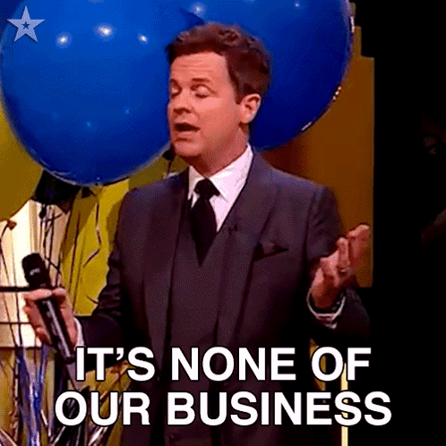 A Man In A Suit And Tie Is Holding A Microphone And Says " It 'S None Of Our Business " GIF