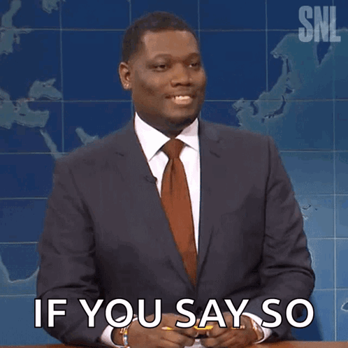 A Man In A Suit And Tie Is Holding A Pencil And Says If You Say So GIF