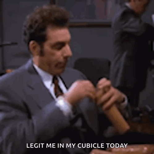 A Man In A Suit And Tie Is Holding A Person 'S Hand And Says `` Legitim Me In My Cubicle Today '' . GIF