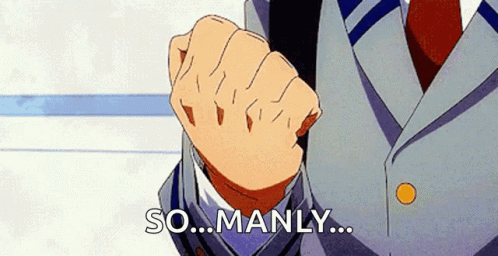 A Man In A Suit And Tie Is Holding His Fist Up In The Air And Saying `` So ... Manly ... '' . GIF