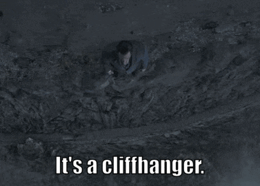 A Man In A Suit And Tie Is Laying In The Dirt With The Words " It 'S A Cliffhanger " Below Him GIF