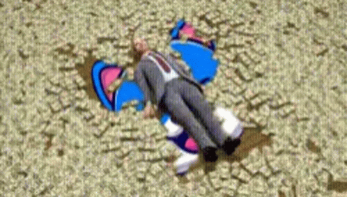 A Man In A Suit And Tie Is Laying On The Ground With A Cartoon Character Behind Him GIF