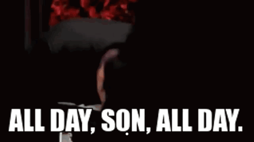 A Man In A Suit And Tie Is Looking At Himself In A Mirror And Saying `` All Day , Son , All Day '' GIF