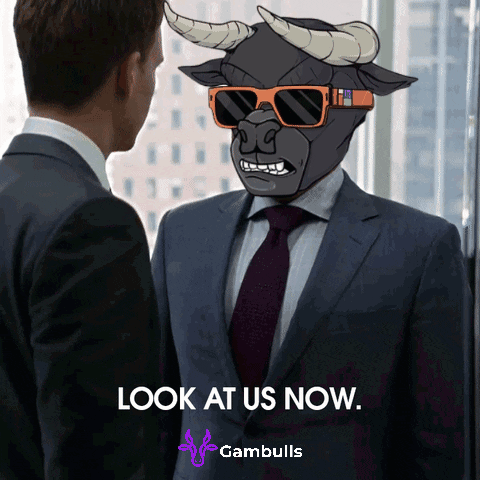 A Man In A Suit And Tie Is Looking At Himself In A Mirror With The Words Look At Us Now At The Bottom GIF