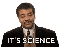 A Man In A Suit And Tie Is Making A Face And Saying `` It 'S Science '' . GIF
