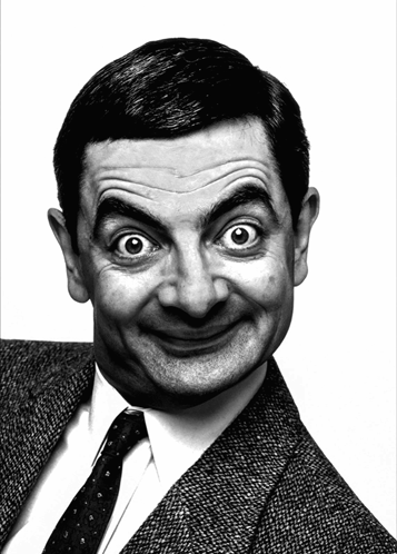 A Man In A Suit And Tie Is Making A Face GIF