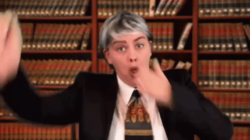 Man In Suit Making Funny Face GIF