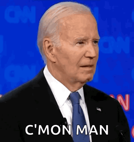 a man in a suit and tie is making a funny face and saying c 'mon man .