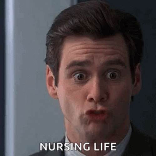 A Man In A Suit And Tie Is Making A Funny Face And Saying Nursing Life . GIF