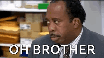 A Man In A Suit And Tie Is Making A Funny Face And Saying Oh Brother . GIF