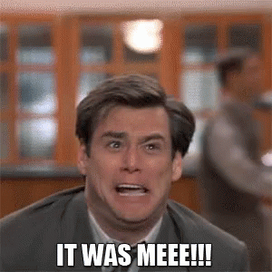 A Man In A Suit And Tie Is Making A Funny Face And Says It Was Meee !!! GIF