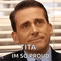 A Man In A Suit And Tie Is Making A Funny Face And Says `` Tita Im So Proud '' . GIF