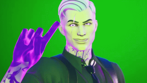 A Man In A Suit And Tie Is Making A Peace Sign GIF