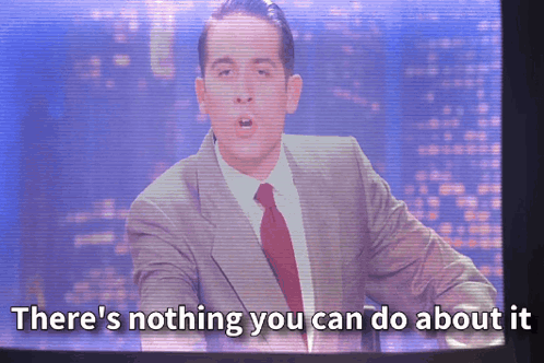 A Man In A Suit And Tie Is On A Screen That Says " There 'S Nothing You Can Do About It " GIF