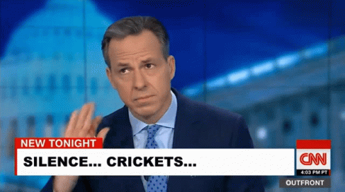 A Man In A Suit And Tie Is On Cnn Talking About Crickets GIF