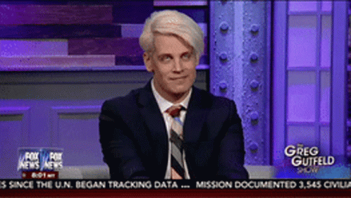 A Man In A Suit And Tie Is On Fox News GIF