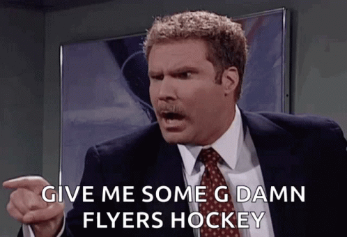 A Man In A Suit And Tie Is Pointing And Saying Give Me Some Damn Flyers Hockey GIF