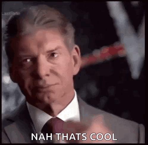 A Man In A Suit And Tie Is Pointing At The Camera And Saying `` Nah That 'S Cool '' . GIF