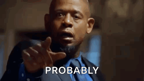 A Man In A Suit And Tie Is Pointing At The Camera With The Word Probably Written Next To Him . GIF