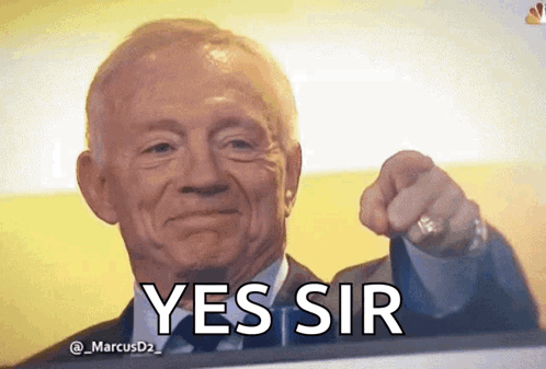 A Man In A Suit And Tie Is Pointing At The Camera With The Words Yes Sir Above Him GIF