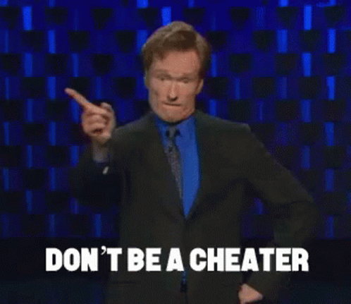 A Man In A Suit And Tie Is Pointing His Finger At The Camera And Says " Don 'T Be A Cheater " GIF
