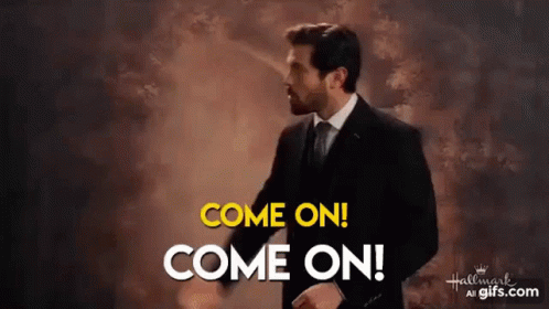 A Man In A Suit And Tie Is Saying Come On Come On . GIF