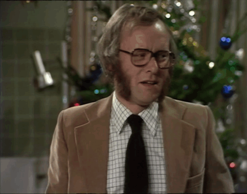 A Man In A Suit And Tie Is Saying I Can 'T Bear It GIF