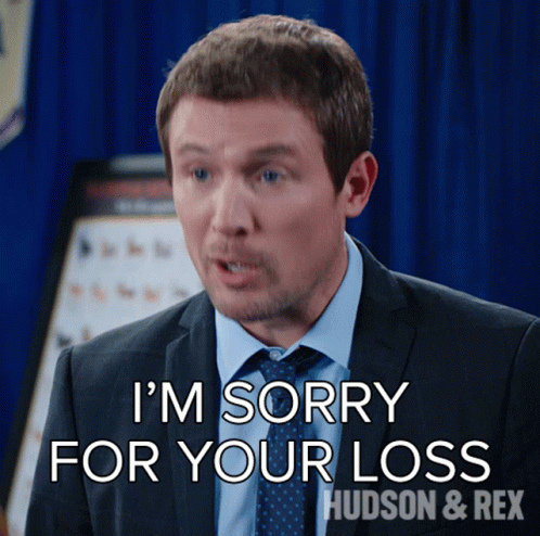 A Man In A Suit And Tie Is Saying I 'M Sorry For Your Loss GIF