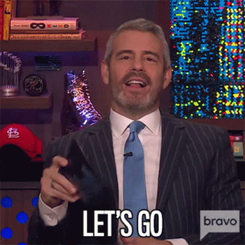 Man In Suit And Tie Saying Let's Go GIF