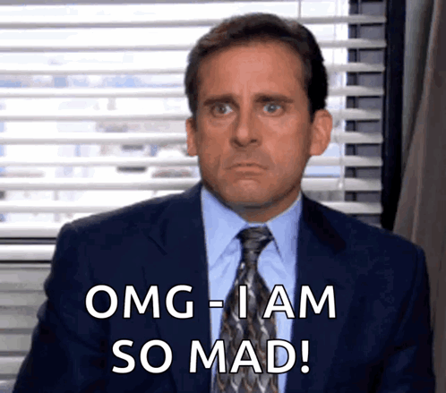A Man In A Suit And Tie Is Saying Omg-I Am So Mad GIF