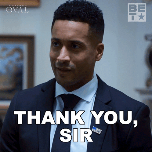 A Man In A Suit And Tie Is Saying Thank You Sir GIF